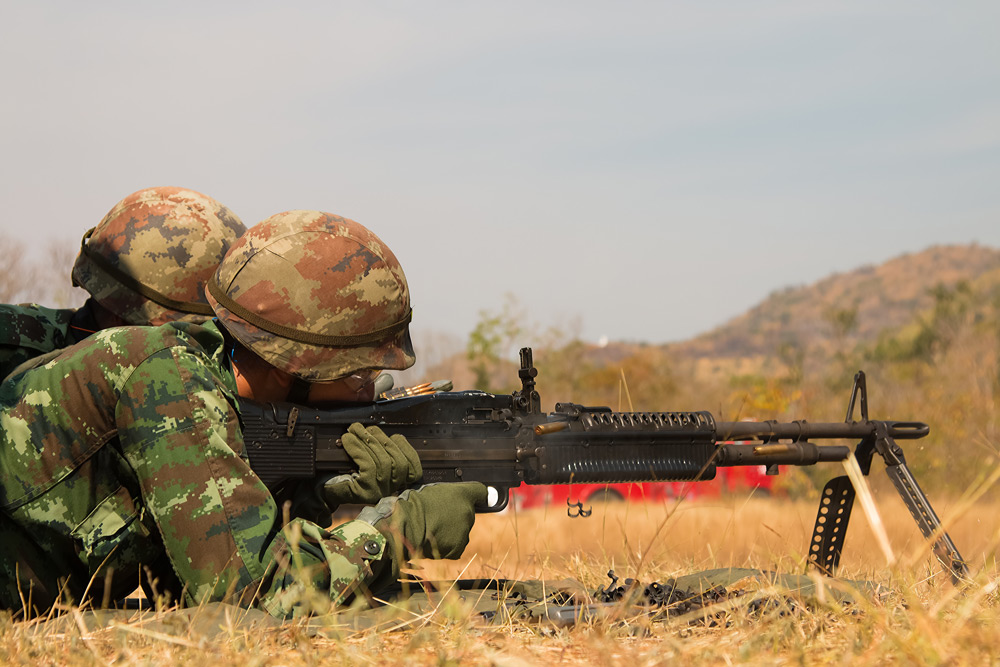 Two army soldiers on a tundra with a 
