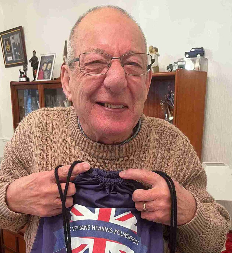 Smiling photo of Mr Wooldridge, hearing life again.