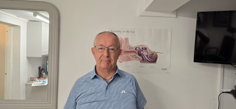 a portrait image of Mr Cook.