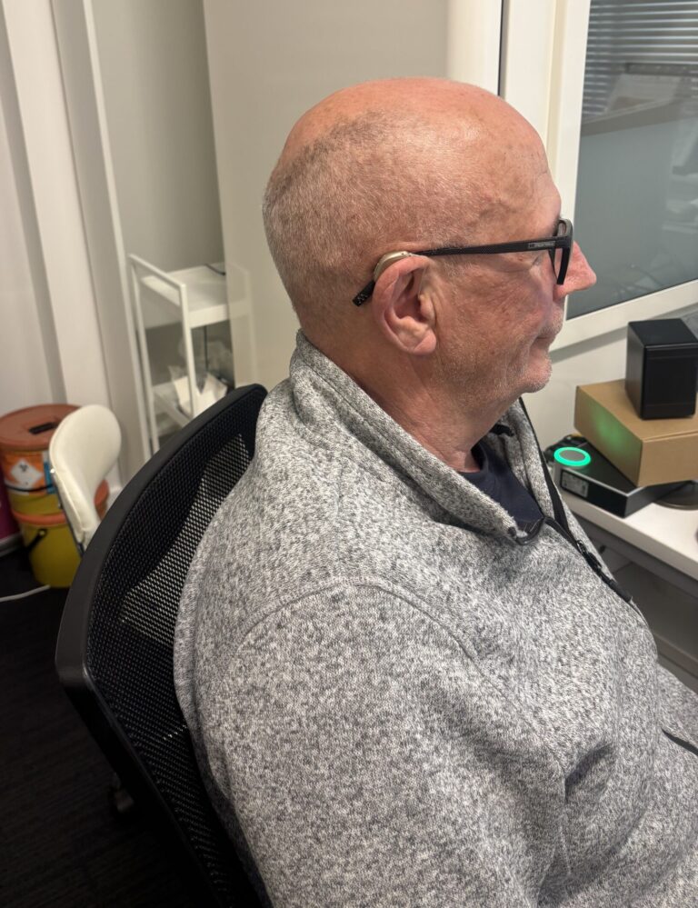 Mr Archibald with his new hearing aids