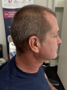 Mr Alan Tandy with his new hearing aids